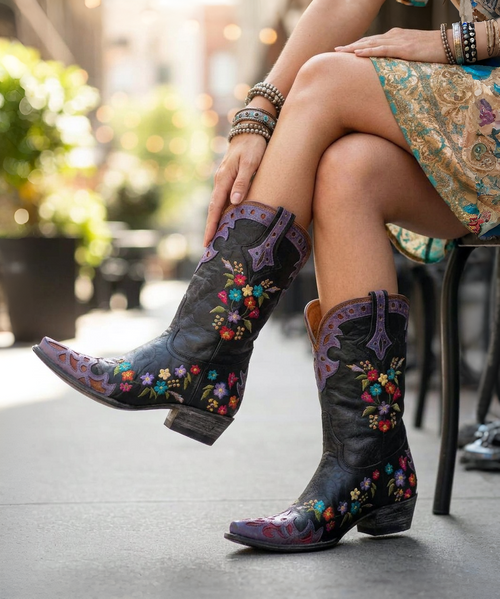 BEAUTIFUL PAIR OF CHOCOLATE LEATHER BOOTS WITH TURQUOISE OVERLAY TOOLING AND TOOLED FLOWERS. THE TWO DIFFERENT COLORED LEATHERS ARE PERFECTLY CRAFTED BY OLD GRINGOS DESIGNERS. THE HAND TOOLING WORK MAKES THESE BOOTS STAND OUT! THESE BOOTS PAIR WONDERFULLY WITH YOUR FAVORITE PAIR OF SKINNY JEANS! BECAUSE OF THE INTRICATE TOOLING DESIGN, THESE BOOTS CAN BE WORN CASUALLY OR ALL DOLLED UP! 

Measurements:

Shaft Height - 18"
Heel - 4 Long
Toe - Snip