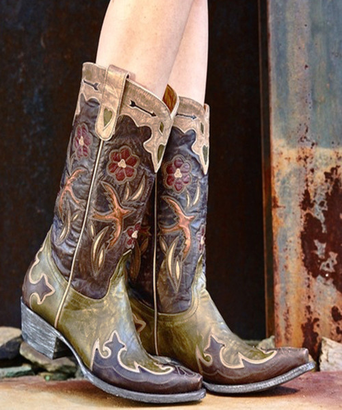 Leather upper features intricate cut outs and overlays that highlight the colorful red flowers, hearts and fall leaves...all put together as a masterpiece of "Art for your Feet". 