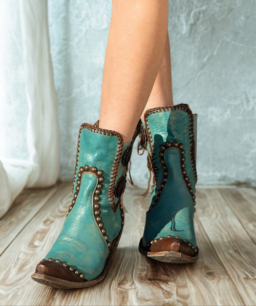 Show off your sense of style with this new arrival from Double D Ranch! The Stockyards is a genuine leather western boot featuring a turquoise leather with stud accents and tassel detail. Pair this with your favorite western looks for a chic style!

Genuine Leather

Shaft Height 8.5"

Leather - Turquoise

Stud Accents

4L Snip Toe

4L Heel