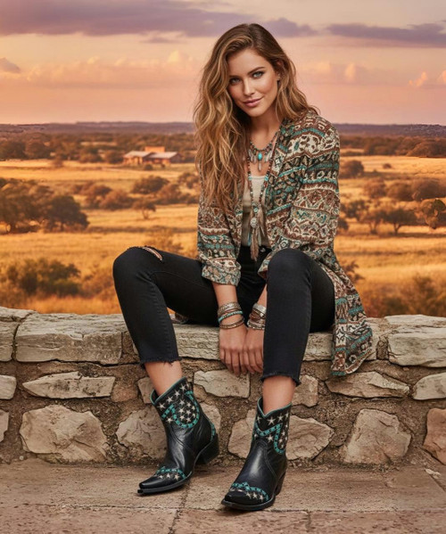 Kick up some fun in these star-spangled cutie booties designed to shine wherever you go! This short, sassy silhouette is endlessly versatile—perfect with everything from skinny jeans to flirty sundresses. So good we made them three ways, these must-have booties come in warm brown, bold black, and a show-stopping red—because one pair is never enough.

Crafted from supple leather, they feature eye-catching contrast leather inlays, contrast lacing, and decorative stitching that add personality and polish. A classic snip toe and comfortable riding heel keep the look sleek and wearable, while the back zipper makes slipping them on effortless.

Fun, flirty, and full of attitude—these booties are ready to become your new everyday favorites.

Details:

Toe: Snip

Leather: Supple leather

Heel: Riding / 9964 (1.65")

Shaft height: 7"

Contrast leather inlays

Contrast leather lacing

Contrast stitching

Back zipper for easy wear