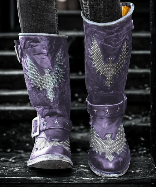 Old Gringo Biker Iron Eagle boot has a new color and it's HOT!  Purple is the "New Black" and we are celebrating it with this gorgeous biker boot from Old Gringo.

Old Gringo Biker Iron Eagle is handmade in good ol' Mexico by Old Gringo. 

Purple, aged vesuvio goatskin leather on foot, strap, and top with grey goatskin inlays and piping; heavily brass studded eagle inlay; stovepipe tops; brass star inlays on straps.

Details for Old Gringo Biker Iron Eagle Purple 12" Biker Boots:

12" height

Babaria toe (round)

FL heel (chunky 2")

Black Snow distressed sole and heel finish