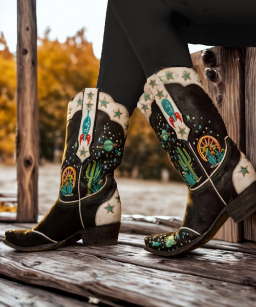 In the words of award winning Kacey Musgraves "these boots weren't made to sit by the door" and our guess is that once you add them to your collection they won't!

With the flare & fashion that Double D Ranch afficionado's have come to expect this boot won't disappoint...celebrate the sun, moon & stars and be taken out of this world with the Space Cowboy...

 

Height = 11"

Toe - Snip

Heel - 9964 Walking Heel