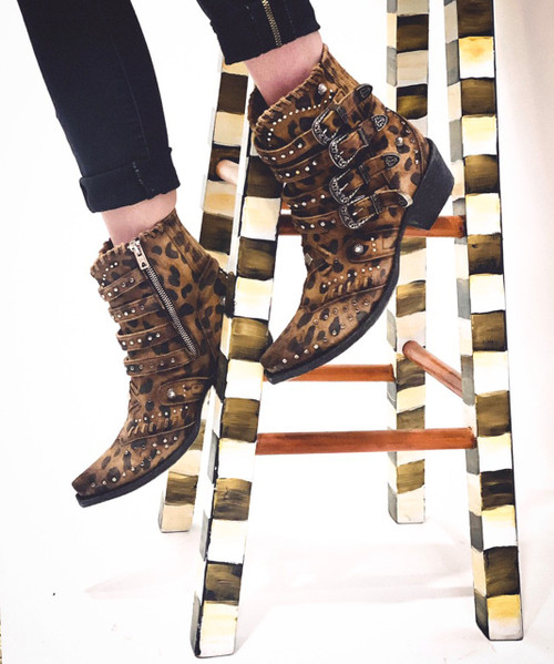 The Old Gringo exclusive cheetah print leather, buckle accents, and antique silver buckle and silver stud work is an over the top fashion statement. These beauties are finished off with interior side zippers, a snip toe, and easy walking heel. 