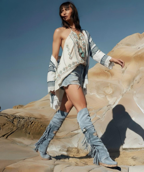 Coleen allows you to explore the world without worrying. 

Its combination of prime quality calf leather and vegetable tanned cowhide guarantees maximum comfort. 

Our vintage treatment, together with hand-stitched raw laces, give this boot a unique touch complemented by indomitable fringes and an elegant side buckle.

Available in this gorgeous spring Sky blue color, Coleen is the perfect travel buddy.
