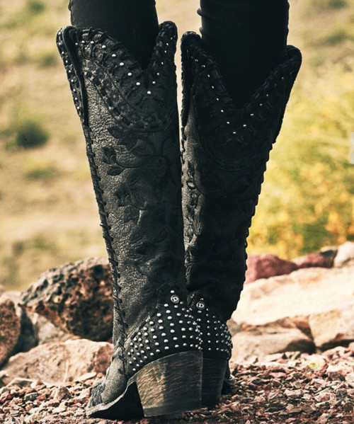 Designed as part of the Fall 2025 Wash House Collection, these cowgirl beauties bring the collection’s signature damask motif to life through intricate embroidery and refined stud detailing. The rich chocolate brown leather is beautifully balanced with icy blues and warm cream tones, while feminine floral accents add a touch of dainty elegance to this timeless Western silhouette.

Finished with a tall riding heel for a confident lift and a sleek snip toe for a refined profile, this 17" shaft boot blends classic cowgirl heritage with elevated, fashion-forward artistry.

Details:

Color: Chocolate

Embellishment: Embroidery & Studding

Heel: Tall Riding Heel (3.5")

Shaft Height: 17"

Toe: Snip Toe

A striking statement boot that captures the romance and craftsmanship of the Wash House Collection.