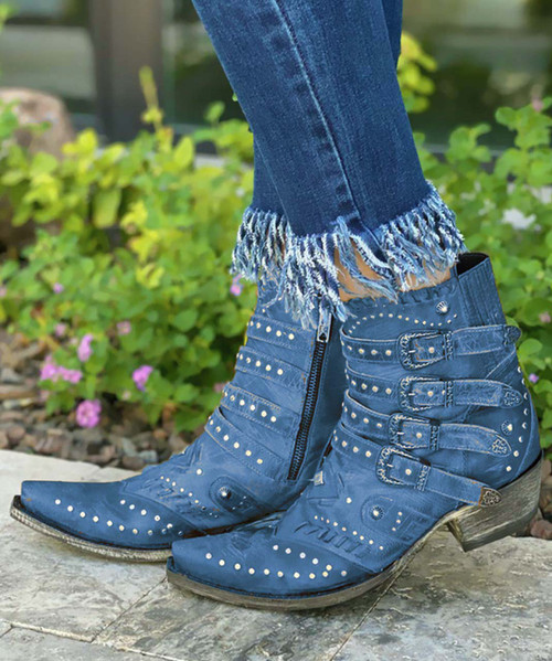 Another great design from Old Gringo, the Jaylene by Old Gringo is everything you want in an ankle boot.   
The soft & subtle Azul Blue leather, buckle accents, and silver stud work is an over-the-top fashion statement. These beauties are finished off with interior side zippers, a snip toe, and easy walking heel. 