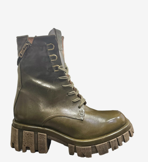 The Haider boot from A.S.98 is designed with functional laces and a sleek asymmetrical zipper, all perched on a comfortable chunky sole for the ultimate style statement.

DETAILS

Leather Upper 
Leather Lining 
Rubber Sole 
2.25" Heel 
1.25" Platform 
7" Shaft Height 
11" Shaft Circumference 
Measurements are taken from size 37
Made In Europe 