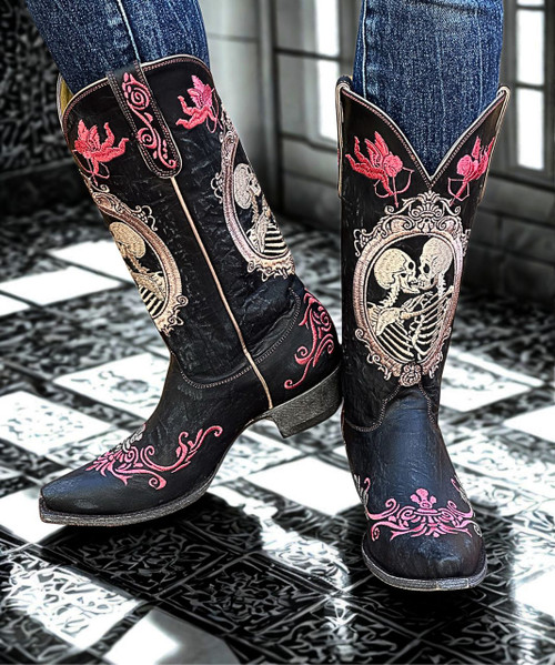 Our cowboy boots bond the time-honored art of handmade boots with a contemporary flair for fashion. Old Gringo Boots are unique, comfortable and made with the highest quality leathers. We add art to footwear using embroidery, Swarovski crystals, stud patterns, inlay/overlay, hand tooling, painting, and laser etching techniques. Every Old Gringo boot is the culmination of an over 250-step production process performed by our skilled craftsmen.

Color: Vesuvio Black

Toe: 4Long 

Heel: 9964

Height: 13"