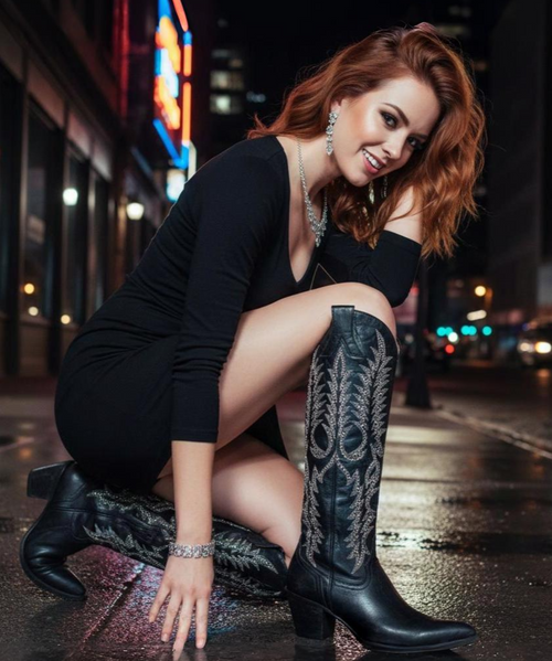 The Old Gringo Mayra Black Cowgirl Boots are an absolute showstopper on their own, now add Swarovski Crystals and the Mayra steals the spotlight. These boots are made from the softest, most beautiful dark black distressed leather you'll ever put against your skin. With an 18-inch boot shaft, you'll be sure to turn heads when you slip into these Old Gringo's. The embroidery on the tall shaft is etched in shiny, silver thread, adding even more personality to these funky boots. The Mayra comes with interior side zippers and ends in a sharp pointed toe. If you are a daring cowgirl diva, then grab the Old Gringo Mayra Boots in black! 


* Shaft Height - 18"
* Shaft Opening - 13.5" circum.
* Heel Height - Sintino 
* Toe - Sintino
* Standard Width