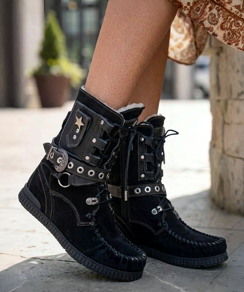 Our Vision moccasin-style boot features a plain over-the-knee bootleg, 2 3/4" hidden wedge, a cool ankle strap and the typical thick handmade stitching on the instep, distinctive feature of El Vaquero brand. Its simplicity gives the Vision boot a timeless elegance. Finished with the renowned Silverstone wash, a milestone of El Vaquero brand, that enhances every shade of leather, showcasing the most intense colors and making each boot unique in its kind.

Hidden wedge 2 3/4"
Vintage Treatment
100% Calf suede
Handmade Stitching
Hand-inserted details
Metal details 100% nickel-free
Rubber sole
Made in Italy