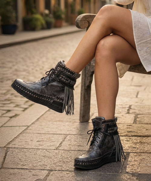 Our Vision moccasin-style boot features a plain over-the-knee bootleg, 2 3/4" hidden wedge, a cool ankle strap and the typical thick handmade stitching on the instep, distinctive feature of El Vaquero brand. Its simplicity gives the Vision boot a timeless elegance. Finished with the renowned Silverstone wash, a milestone of El Vaquero brand, that enhances every shade of leather, showcasing the most intense colors and making each boot unique in its kind.

Hidden wedge 2 3/4"
Vintage Treatment
100% Calf suede
Handmade Stitching
Hand-inserted details
Metal details 100% nickel-free
Rubber sole
Made in Italy
