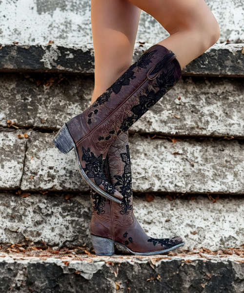 The Women's Old Gringo Nicolette Boots is a beautifully versatile boot. 


Made of brass distressed leather and finished with black floral embroidery, this cowgirl boot will go with EVERYTHING! 

Featuring a taller top, snip toe, and slightly higher heel, if you're looking for a sexy boot, this is it!

The Women's Old Gringo Nicolette Boots fit true to size.

leather
Shaft Height - 15"
Shaft Opening - 15.5" circumference
Heel Height - 2.5" (sintino)
Toe - Snip
Standard Width