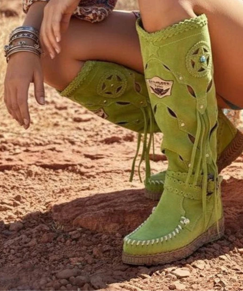 Our Vision moccasin-style boot features a plain over-the-knee bootleg, 2 3/4" hidden wedge, a cool ankle strap and the typical thick handmade stitching on the instep, distinctive feature of El Vaquero brand. Its simplicity gives the Vision boot a timeless elegance. Finished with the renowned Silverstone wash, a milestone of El Vaquero brand, that enhances every shade of leather, showcasing the most intense colors and making each boot unique in its kind.

Hidden wedge 2 3/4"
Vintage Treatment
100% Calf suede
Handmade Stitching
Hand-inserted details
Metal details 100% nickel-free
Rubber sole
Made in Italy