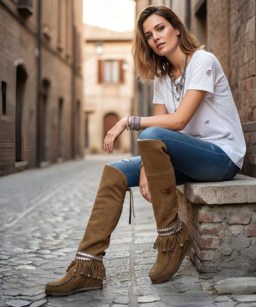 Like in the old movies, Mia brings a timeless nostalgic look with her.

Simple in details, with extra comfortable leg and hand-stitched details.

The Mia's finishing touch is achieved through our vintage treatment that makes each pair unique.

2 3/4" internal wedge heel
1 1/2" wedge sole
Handmade seams
Vintage Treatment
Metal details 100% nickel-free
Leather details
Rubber sole
100% Calf