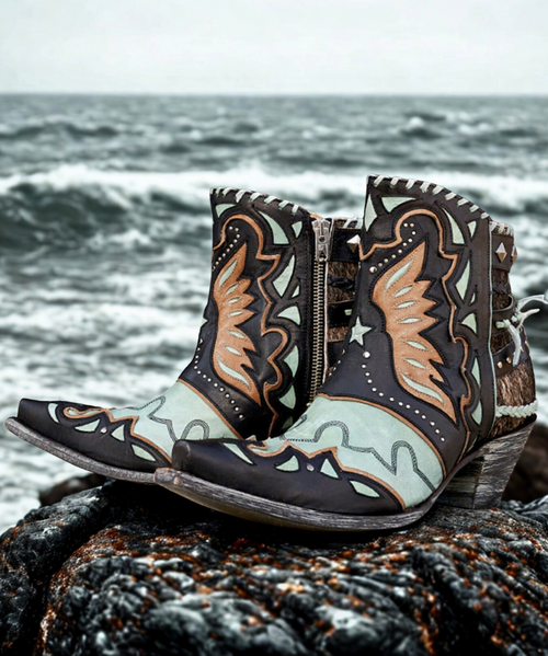 Color: Black/Aqua

Toe: Sintino-4

Heel: 4Long

Height: 6"

Leather: Goat

 
At Old Gringo, there is a passion for our product, for fashion and for always being one step ahead of the rest. We see beyond traditional style and work tirelessly to develop handcrafted pieces that combine classic western charm with contemporary edge. Each handmade piece is its own experience, with a unique personality that is sure to inspire and spark conversation among friends and strangers alike.