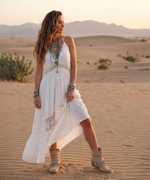 Note - Custom Order sizes due to arrive 90 - 120 days from order date. 

Lena features a 2 3/4" internal wedge, a soft toe cap, and a lace-up ankle strap with a decorative buckle. It's finished with handcrafted stitching and fringe around the entire perimeter of the shoe, for a boho look with a strong vintage feel. Crafted from this suede calfskin with a vintage finish, enhanced by the renowned Silverstone wash. Each hide is unique, with intense hues and a worn-in look that tells a story.

Internal wedge 2 3/4"
Vintage Treatment
100% Calf Suede
Handcrafted stitching
100% nickel-free metal details
Rubber sole
Made in Italy