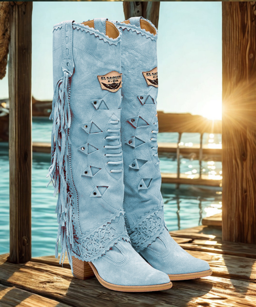 Featuring a double shaft that is extremely elaborate and rich in details, the Katherine boot is one of El Vaquero's absolute bestsellers. Katherine features a 2 3/4" heel, side fringes, metal elements and leather decorations that wrap around the ankle. Finished with the famous Silverstone wash, a cornerstone of the El Vaquero brand, which enhances every nuance of the leather in its most intense colors and makes each boot different and one of a kind.