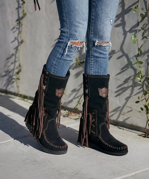 Our Vision moccasin-style boot features a plain over-the-knee bootleg, 2 3/4" hidden wedge, a cool ankle strap and the typical thick handmade stitching on the instep, distinctive feature of El Vaquero brand. Its simplicity gives the Vision boot a timeless elegance. Finished with the renowned Silverstone wash, a milestone of El Vaquero brand, that enhances every shade of leather, showcasing the most intense colors and making each boot unique in its kind.

Hidden wedge 2 3/4"
Vintage Treatment
100% Calf suede
Handmade Stitching
Hand-inserted details
Metal details 100% nickel-free
Rubber sole
Made in Italy