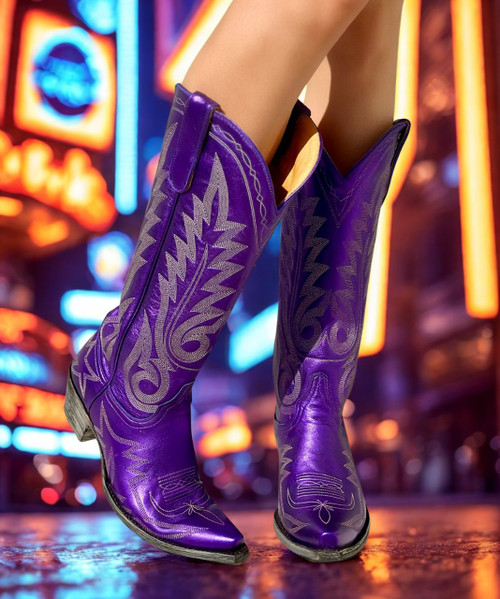 Shaft 15" 
4L Snip Toe
9964 Walking Heel
Purple metallic leather vamp and shaft upper embroidered with a jagged, multi-row stitch pattern
Cream Embroidery 
Leather Lining
Leather Sole 