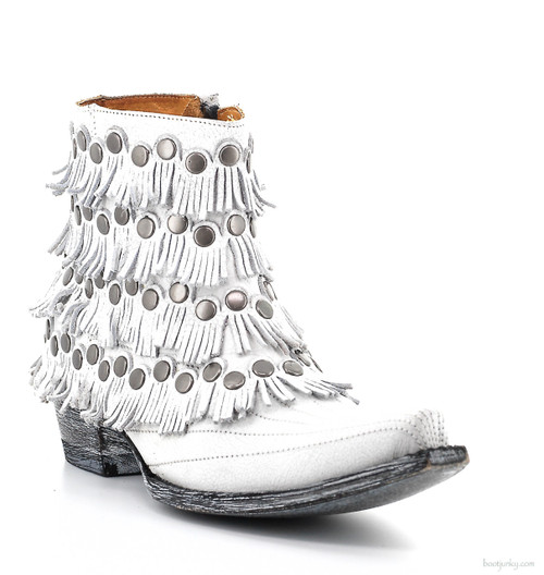 Studded and fringed Crackelata White leather boots from Old Gringo stake a definitive claim to your own brand of style.

These spirited, studded and fringed distressed white leather boots from Old Gringo are generously embellished in soft and subtle leather. 
Short and sassy fringe.
Nailhead studs
Distressed vintage finish
Side zip. 
6" Shaft
Snip Toe
1-3/4" heel.
Imported from Mexico