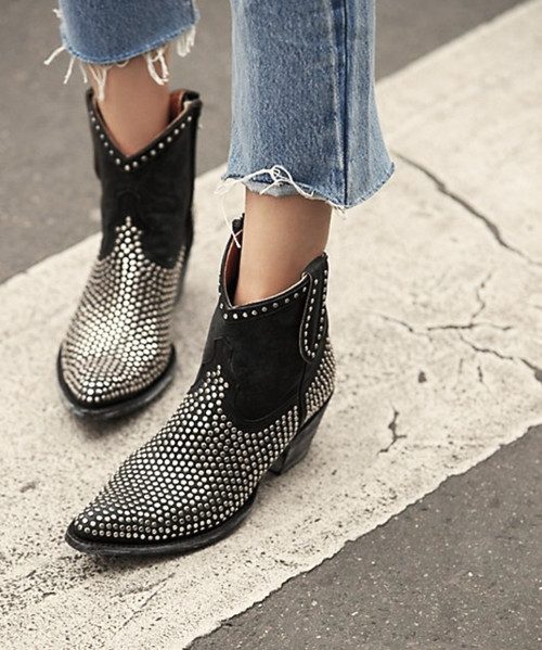 Western-inspired riveted Mexicana by Old Gringo Boots ankle booties featuring a distressed look with studded accents throughout.

Chunky block heel
Side zipper closure