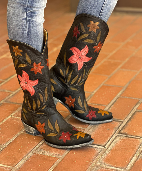 BOOT JUNKY IS AT IT AGAIN!!!   WE ARE PROUD TO OFFER YOU THE OLD GRINGO "GINGER" BLACK FLORAL BOOTS MADE FROM ULTRA SOFT GOAT SKIN.  THESE SHOW STOPPING BOOTS ARE STUDDED WITH AN ANTIQUE PEWTER IN THE CENTER OF EACH FLOWER. JUST TO FURTHER ACCENT THIS BOOT, THE FLORAL LEATHER INLAYS ARE DONE IN COLORS THAT SET THIS BOOT APART FROM THE COMPETITION.  DON'T MISS THIS CHANCE TO PUT THESE IN YOUR CLOSET.  THESE GORGEOUS CUSTOM BOOTS ARE DESIGNED BY AND AVAILABLE ONLY AT BOOT JUNKY. 