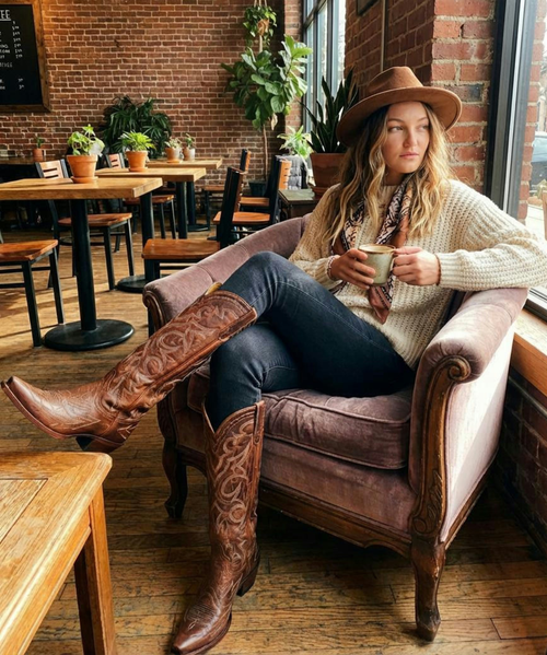 Pointed Toe Tall Boots | Brown

Classic western style meets artful detail in these stunning pointed-toe tall boots. Crafted from 100% cow leather, this rich brown beauty features eye-catching multicolor stitching that adds depth, personality, and a handcrafted feel to a timeless silhouette.

Standing 17 inches tall, these boots create an elegant, leg-lengthening look, while the low 1.6" heel offers comfort and effortless wear from day to night. Finished with a leather sole, leather heel, and sturdy side pull tabs, every detail reflects quality craftsmanship and authentic western tradition.

Made in Mexico, these boots are designed to be worn, loved, and styled season after season.

Details:

Color: Brown

Leather: 100% Cow Leather

Toe: Pointed Toe

Shaft Height: 17"

Heel Height: 1.6"

Multicolor stitching detail

Leather sole & leather heel

Side pull tabs

Made in Mexico

A timeless tall boot with just the right touch of color and character. ?✨