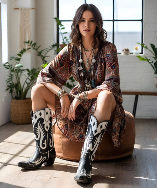 At Old Gringo, there is a passion for our product, for fashion and for always being one step ahead of the rest. We see beyond traditional style and work tirelessly to develop handcrafted pieces that combine classic western charm with contemporary edge. Each handmade piece is its own experience, with a unique personality that is sure to inspire and spark conversation among friends and strangers alike.

Model: DDL1063-2

Color: Black/White

Toe: 4Long

Heel: 9964

Height: 13"

Leather: Goat/Cowhide