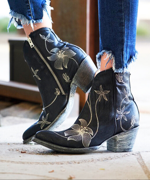 Finely crafted and floral embroidered, these gorgeous leather ankle boots, from the master craftsmen at Old Gringo, will be the center of attention in any room you enter or with every step you take. Fashioned with an inside zipper, ivory/silver embroidered flowers, stacked leather heels and leather soles the Old Gringo Flora Loca boot is a must have for any collection.
