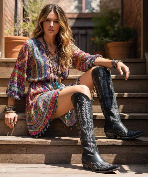 We are so excited to announce the availability of the new Mayra Bis Prism.

Experience the best in comfort and style with this fabulous new leather! Its amazing iridescent color reflects different shades from every angle, making it truly unique.

One of our best Mayra's yet, it's a must-have addition to your wardrobe. Elevate your fashion game and feel confident with every step.

*Depending on where you are looking, this boot will reflect pink, purple, green, and blue. The full spectrum!

* Shaft Height - 18"
* Shaft Opening - 13.5" circum.
* Heel Height - 1 & 3/4" (9964)
* Toe - Snip
* Standard Width