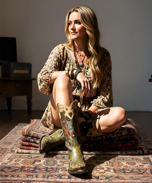 Leather upper features intricate cut outs and overlays that highlight the colorful red flowers, hearts and fall leaves...all put together as a masterpiece of "Art for your Feet". 