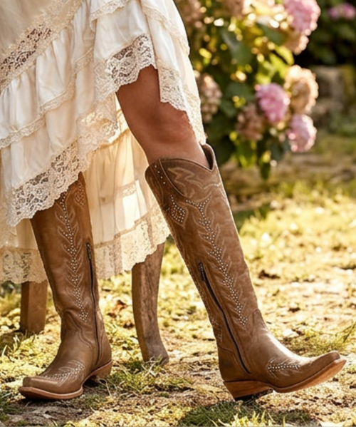 This brown tall boot combines style and sophistication with its rich color and sleek design. Its height flatters the legs, making it versatile enough to pair with jeans or dresses. Crafted from high-quality materials, this boot is a must-have for any wardrobe, offering comfort and confidence for any occasion.
