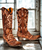 Old Gringo Olivia Boots are absolutely works of art. The attention to the embroidery and perfect use of colors are sure to make a statement! The Olivia boot is so uniquely handcrafted and provides all day comfort. Pair these with everything from your favorite denim to your best sundress for a chic look! Each boot is hand stitched and is individually unique. 

Brass Vesuvio Vamp and Shaft
Ornamental Floral Embroidered Accents
13" Shaft Height
Snip Toe
Heel Height 1.75"