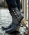 The inspiration for this boot came from a pair of Dale Evan's shoes we saw at auction.  The catalog listing read, "The consummate Dale Evans/Cowgirl/Bohlin unique personal artifact. These size 5 1/2 hand floral-tooled black high heels were custom made for Dale by Evans of California and have 3 3/4" high Edward H Bohlin, Hollywood, engraved sterling silver heel caps. c 1940s-50s".  

 These shoes are now in the Cowgirl Hall of Fame and are currently being restored.  Double D Ranch is underwriting the restoration of these fabulous shoes that inspired the tooled-silver heels of our '0l San Antonio Rose Boot.

 Features:

Toe: snip

Leather: laser embossed leather with solid contrast

Heel: engraved silver heel caps 2 3/4" height

Nail heads

Floral conchos