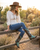 These boots are a bold, statement-making pair of western showstoppers that fuse classic cowboy craftsmanship with edgy, artistic detail ?✨

Crafted in a rich two-tone leather combination, the base features deep chocolate brown paired with a striking turquoise crackled finish that gives a vintage, worn-in character.

Key Design Features:
Intricate inlay and embroidery work in turquoise, creating flowing, western-inspired patterns along the shaft and vamp
Mixed metal embellishments, including studs, domed hardware, and decorative accents that add texture and dimension
Prominent cross appliqués and concho-style details, giving the boots a bold, southwestern, almost heirloom feel
A studded center seam running vertically up the shaft for added edge and structure
Subtle distressing throughout for that perfectly broken-in, authentic look
Silhouette & Structure:
Classic snip/pointed toe for a sharp, feminine western profile
Mid-height stacked heel that’s both flattering and wearable
Tall shaft designed to stand out whether paired with denim or dresses
Overall Vibe:

These boots blend rock-and-roll western attitude with artisan craftsmanship—perfect for someone who wants a standout, collectible piece. They feel equal parts vintage, rebellious, and luxurious, making them the kind of boots that instantly elevate any outfit