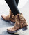 The Clint Boot by El Vaquero is a striking over-the-knee silhouette that blends refined craftsmanship with effortless summer elegance. Distinguished by a sleek ankle strap and beautifully detailed leather accents along the shaft, this boot delivers unmistakable style with a soft, artisanal feel.

Crafted in Italy from a unique combination of luxurious calfskin suede and fine natural linen, Clint offers a fresh, lightweight construction that’s perfect for warm-weather styling. The subtle 7 cm internal wedge provides comfortable lift without compromising ease, while the vintage treatment adds character and depth to every pair.

Finished with handcrafted stitching, nickel-free metal details, and a durable rubber sole, the Clint boot is designed for confident, all-day wear. Elegant yet relaxed, it pairs effortlessly with flowy dresses, tailored shorts, or layered summer looks.

Details:

Over-the-knee boot

Internal wedge: 7 cm

Vintage treatment

100% calfskin suede and natural linen

Handcrafted stitching

Nickel-free metal details

Rubber sole

Made in Italy