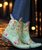 The Old Gringo Sora Aqua Cowgirl boots are simply gorgeous. Old Gringo uses the softest, most high-quality leather to make cowgirl boots. The Sora is decorated with intricate floral embroidery etched in gorgeous colors like vibrant pink, red, purple, yellow, and orange. These little ankle boots will look fabulous with dresses during the Spring and Summer, but you can also wear them with skinny jeans for Fall and Winter. The Sora style is sweet and feminine, sure to add a whisper of western detail to your wardrobe. Don't be afraid to be bold and colorful in the Old Gringo Sora Aqua cowgirl boots!   A hard-to-find heel and toe combination will give you hours of comfortable wear.

Measurements:

Shaft Height - 8"
Heel Height - 9964 (traditional)
Toe - 4L (snip)
