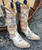 Old Gringo brings another patriotic hit to the Yippee Ki Yay Jorie boot.

The design captures freedom with flag stripes and all of the symbols we have come to love about America.

Embroidered stars, stamped Eagles, nickel studs, and denim overlay make this patriotic boot a must have for any serious Old Gringo boot collector...let this boot shout "Land of the Free and Home of the Brave".

Measurements:

Shaft Height - 13"
Heel Height - 1 3/4" 
Toe - Snip
Heel - 4Long