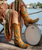 BEAUTIFUL PAIR OF CHOCOLATE LEATHER BOOTS WITH TURQUOISE OVERLAY TOOLING AND TOOLED FLOWERS. THE TWO DIFFERENT COLORED LEATHERS ARE PERFECTLY CRAFTED BY OLD GRINGOS DESIGNERS. THE HAND TOOLING WORK MAKES THESE BOOTS STAND OUT! THESE BOOTS PAIR WONDERFULLY WITH YOUR FAVORITE PAIR OF SKINNY JEANS! BECAUSE OF THE INTRICATE TOOLING DESIGN, THESE BOOTS CAN BE WORN CASUALLY OR ALL DOLLED UP! 

Measurements:

Shaft Height - 18"
Heel - 4 Long
Toe - Snip