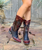 You're wearing a piece of fine art when you wear Old Gringo's Goldonrina Navy, Red, & Bone .  The leather upper features an intricate cut-out and overlay design that includes colorful leather insets and a contrast-color vamp and collar. 