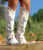 A Little Bit of Country + A Little Bit of Rock & Roll.  Embellished with crystals, studs and embroidered rose in silver, finished off with a metal ring harness with a buckle strap over the ankle. 

A piece of art, that's exactly what this boot is.

Hand placed silver studs, sparkling crystals and outstanding silver rose embroidered across the shaft, all come together against the signature Old Gringo Crackled white leather. Tall European Silhouette, Silver brush off finish on the sole; it's a boot like no other boot.  
