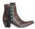 Step up your boot game with this season’s popular mid-calf length. Double D Ranch’s Apache Kid Boot adds a few more inches, a little more coverage, and a lot more style points.  Hand crafted in calfskin with contrast trim and sassy fringe, but it is the turquoise studded conchos that take this boot over the top.  

toe: snip 
leather: calfskin with suede contrast
toe: snip toe
heel: tall riding/Sintino (2.5")
shaft height: 7"
features: nail heads, navajo style conchos, self lacing and fringe