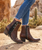 BEAUTIFUL PAIR OF CHOCOLATE LEATHER BOOTS WITH TURQUOISE OVERLAY TOOLING AND TOOLED FLOWERS. THE TWO DIFFERENT COLORED LEATHERS ARE PERFECTLY CRAFTED BY OLD GRINGOS DESIGNERS. THE HAND TOOLING WORK MAKES THESE BOOTS STAND OUT! THESE BOOTS PAIR WONDERFULLY WITH YOUR FAVORITE PAIR OF SKINNY JEANS! BECAUSE OF THE INTRICATE TOOLING DESIGN, THESE BOOTS CAN BE WORN CASUALLY OR ALL DOLLED UP! 

Measurements:

Shaft Height - 18"
Heel - 4 Long
Toe - Snip