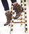 The Old Gringo exclusive cheetah print leather, buckle accents, and antique silver buckle and silver stud work is an over the top fashion statement. These beauties are finished off with interior side zippers, a snip toe, and easy walking heel. 