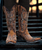 Old Gringo Dolce Stud – Shedron Leather
Classic Western soul meets contemporary edge in the Dolce Stud boot by Old Gringo. Handcrafted from rich, distressed shedron leather, this striking style features artistic stitching and carefully placed silver stud accents that add just the right amount of sparkle and sass.

With a timeless silhouette and modern attitude, the Dolce Stud embodies everything we love about Old Gringo — heritage craftsmanship, elevated design, and a bold cowgirl spirit. Whether you're dressing up denim or adding edge to a flowing skirt, this boot delivers effortless style with standout detail.