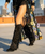 The most striking feature of our Katherine boot is the incredible attention to details. This pointed toe model features a 2 3/4" heel, side fringes and leather patterns and motifs around the ankle. Featuring carvings on the shaft with the addition of metallic elements, this western-style boot is then finished with the vintage treatment that gives wonderful shades to the leather. Available in this Carbon Silverstone color dreaming of amazing destinations around the world has never been easier.
