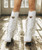 The most striking feature of our Katherine boot is the incredible attention to details. This pointed toe model features a 2 3/4" heel, side fringes and leather patterns and motifs around the ankle. Featuring carvings on the shaft with the addition of metallic elements, this western-style boot is then finished with the vintage treatment that gives wonderful shades to the leather. Available in this Carmel Silverstone color dreaming of amazing destinations around the world has never been easier.

Heel - 2 3/4" leather stacked heel

Toe - Sintino style toe

Height - 17"

Handmade stitching

Hand-inserted details