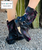 Short, ankle to mid calf, distressed black fuchsia, moto biker style boot with heel buckle embellishment