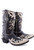 These bold boots channel Billy the Kid and are serving up renegade Wild West vibes with cactus and cow skull embroidery on the shaft, complemented by contrasting leather overlay and trim. Edgy and awesome!
