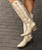 Immerse yourself in western style with our ALLIE Gold Cracked Leather boots. These elegant boots not only provide a touch of glamour but also stand out with subtle 
embroidery on the shaft and toe, adding a touch of sophistication and authenticity to your outfit.
Measurements:

Shaft Height - 17"
Heel Height - 2" 
Toe - Round Pointed
Standard Width